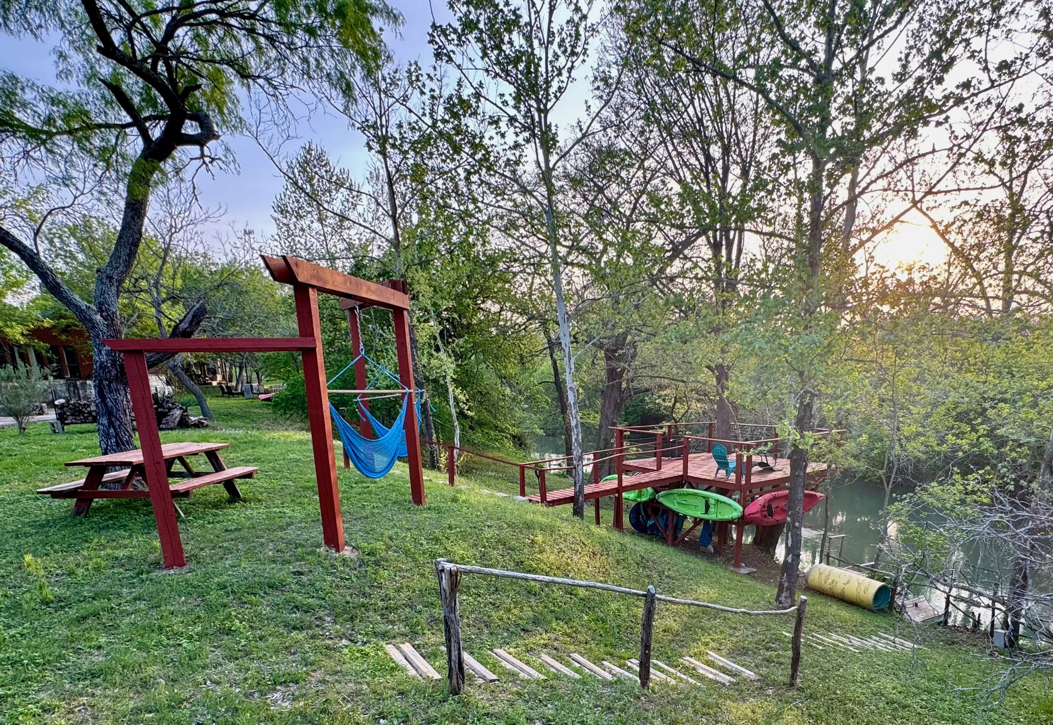 1512 River Grove Road, Unit A Kingsbury, TX 78638 - Photo 12 of 35 View of playground featuring a yard and a deck