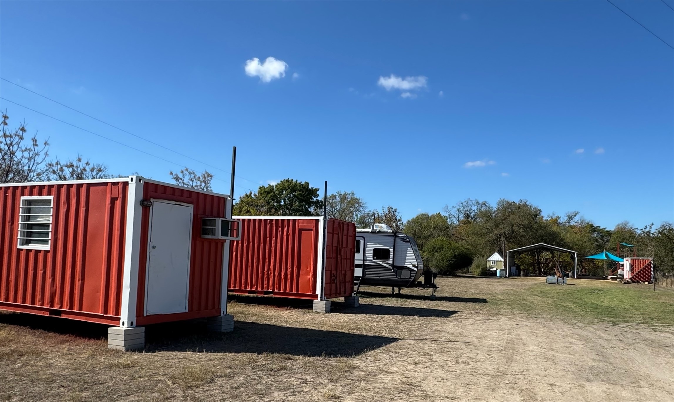 1512 River Grove Road, Unit A Kingsbury, TX 78638 - Photo 32 of 35 View of outbuilding featuring a detached carport