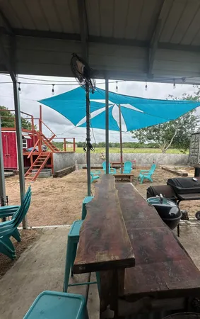 a childrens park with lots of swings and slides