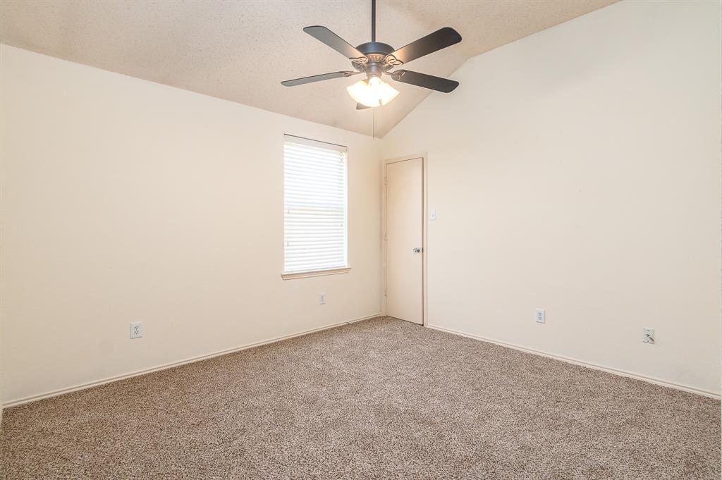 107 Hazelnut Trail Forney, TX 75126 - Photo 17 of 37 One of the Secondary Bedrooms with walk-in closet.