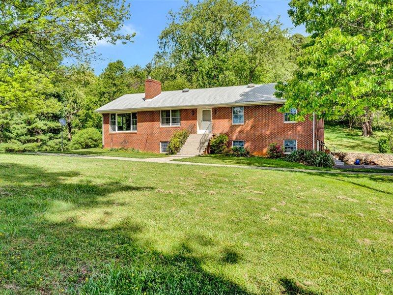 249 Zimmerman Road Blue Ridge, VA 24064 - Photo 3 of 33 a view of a house with a yard