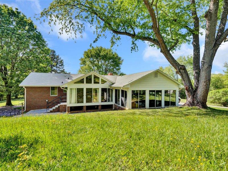 249 Zimmerman Road Blue Ridge, VA 24064 - Photo 26 of 33 front view of a house with a yard