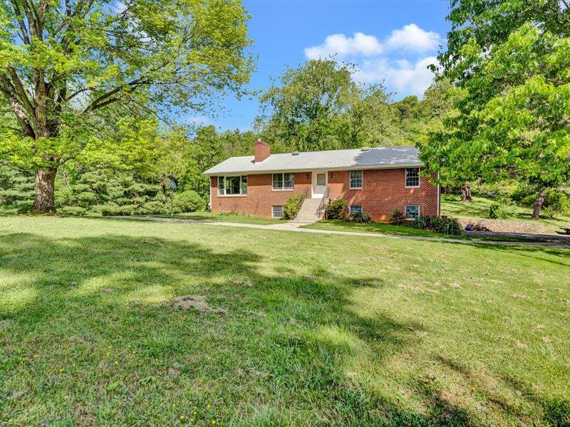 249 Zimmerman Road Blue Ridge, VA 24064 - Photo 27 of 33 a view of front of house with yard