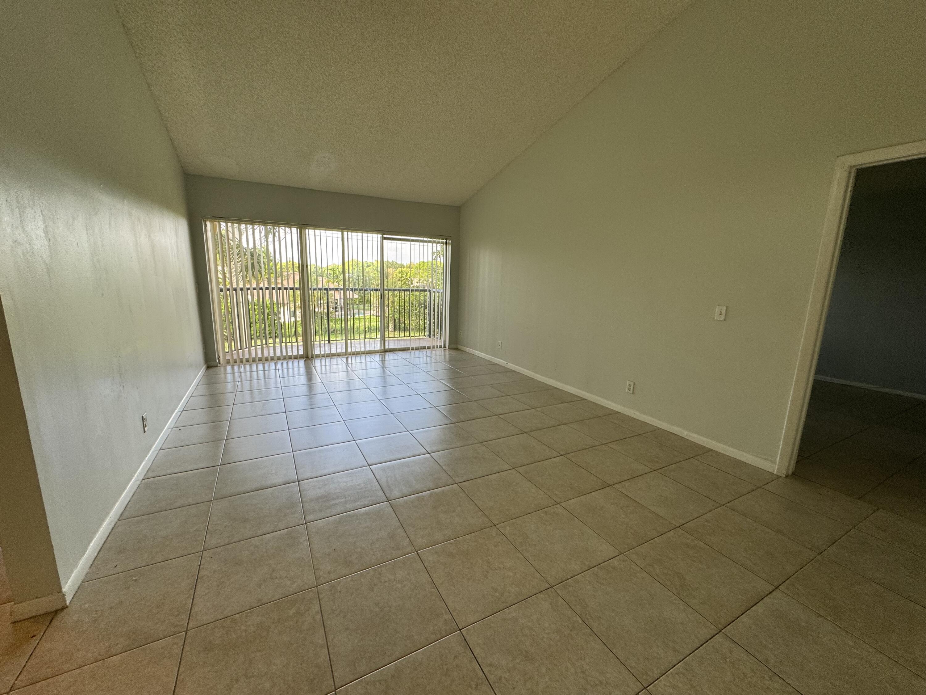 8891 Wiles Road, Unit 303 Coral Springs, FL 33067 - Photo 4 of 10 IMG_2997