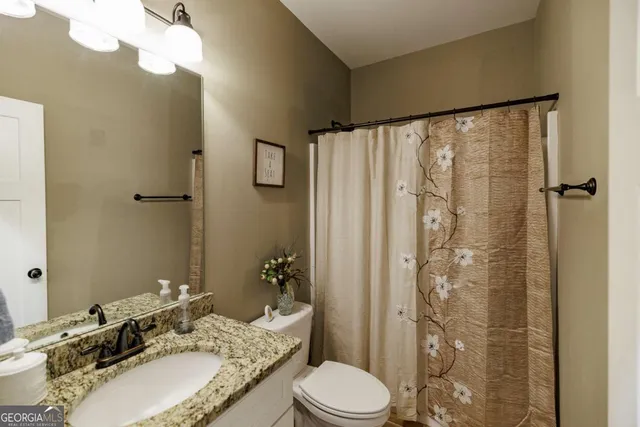 a view of a workspace with furniture