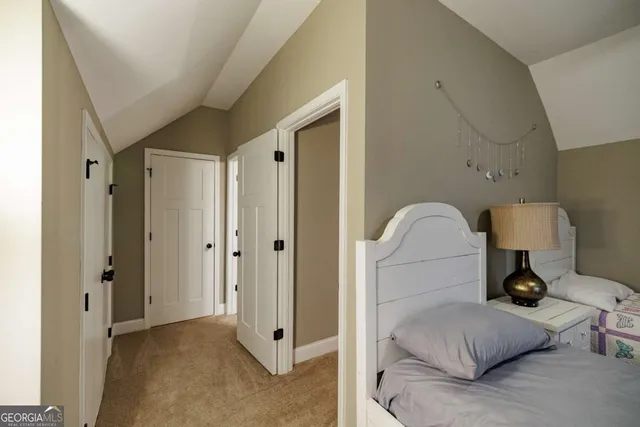 a house with trees in the background