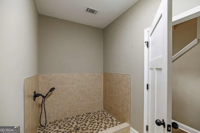 a swimming pool with trees in the background