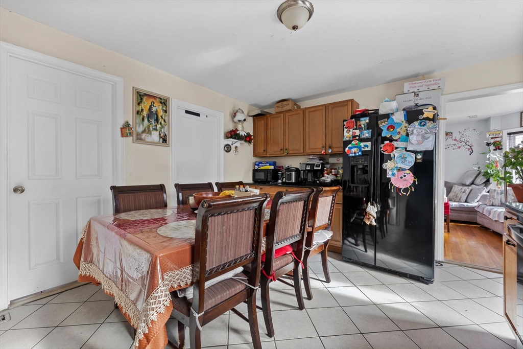 33 Chestnut Street Milford, MA 01757 - Photo 16 of 41 a view of a dining room with furniture