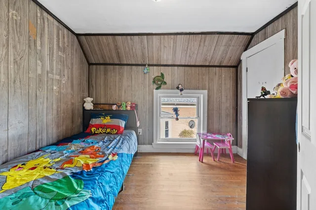 a utility room with furniture and toys