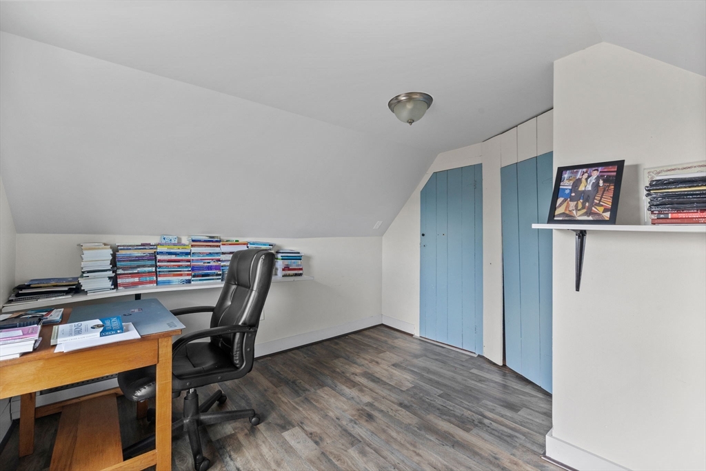 33 Chestnut Street Milford, MA 01757 - Photo 32 of 41 a view of a workspace with furniture and wooden floor