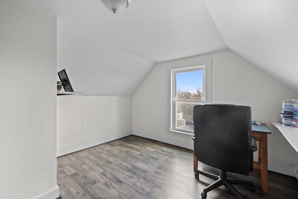 33 Chestnut Street Milford, MA 01757 - Photo 33 of 41 a view of a workspace with furniture and a window