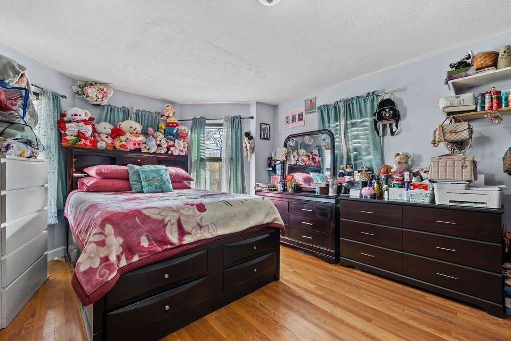 33 Chestnut Street Milford, MA 01757 - Photo 5 of 41 a bed room with a bed and a bed