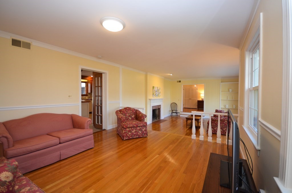 19 Butternut Drive Sutton, MA 01590 - Photo 8 of 33 a living room with furniture and a table