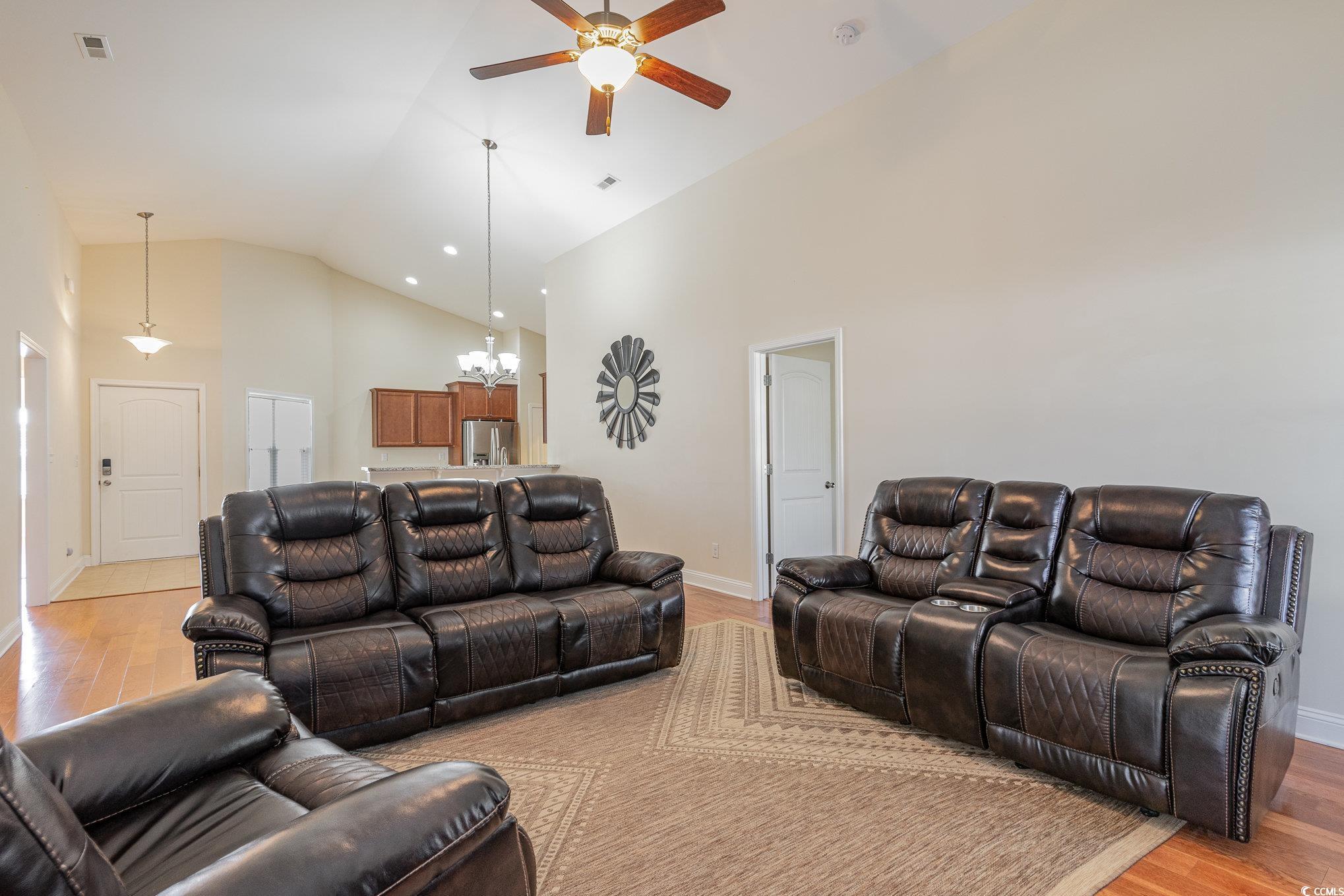 321 Cabo Loop Myrtle Beach, SC 29588 - Photo 5 of 25 Living area featuring light wood-type flooring, ba