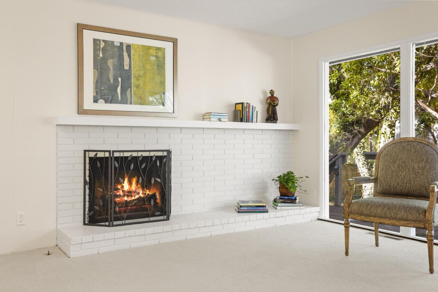 3112 Stevenson Drive Pebble Beach, CA 93953 - Photo 19 of 47 a living room with furniture and a fireplace