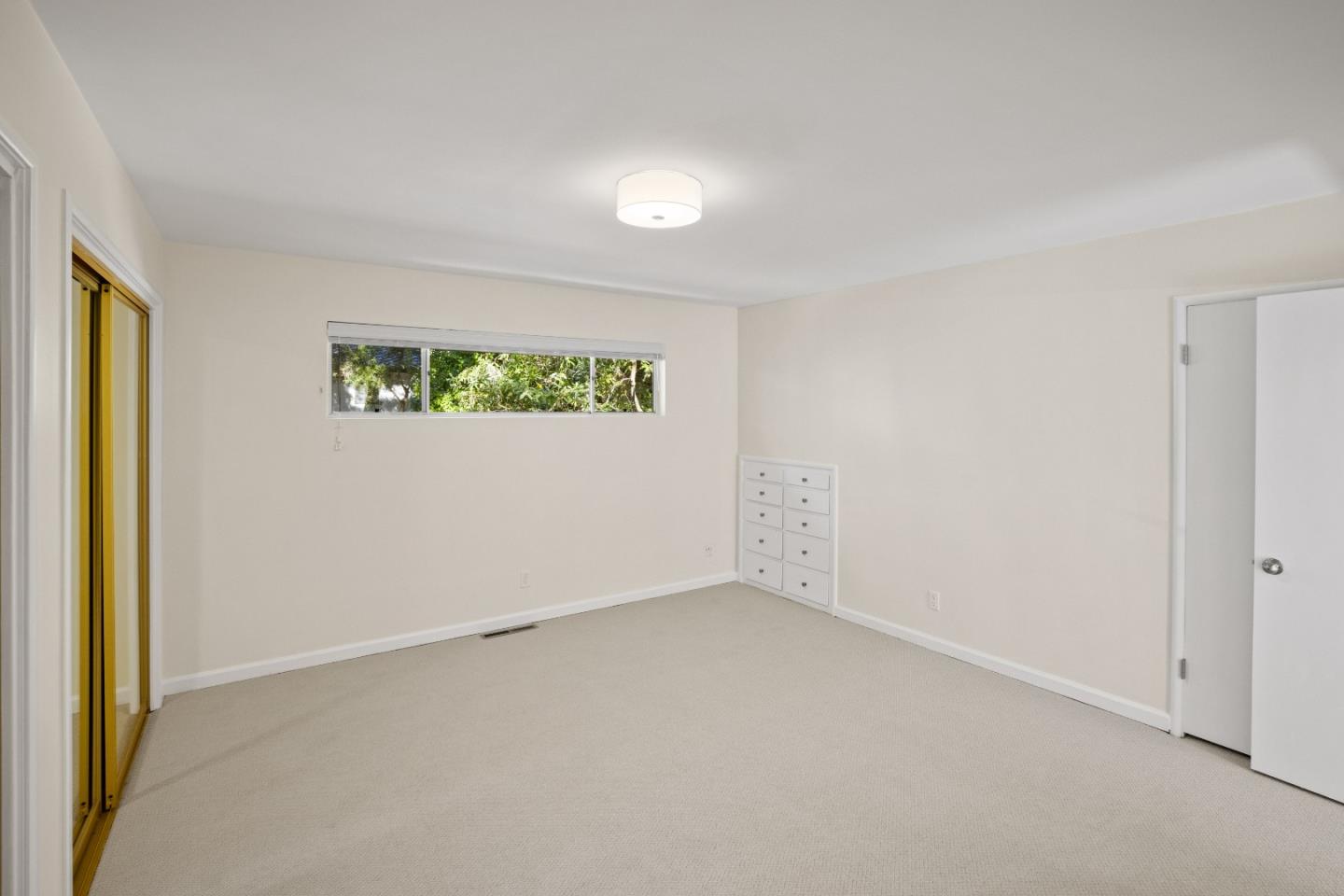 3112 Stevenson Drive Pebble Beach, CA 93953 - Photo 23 of 47 an empty room with windows