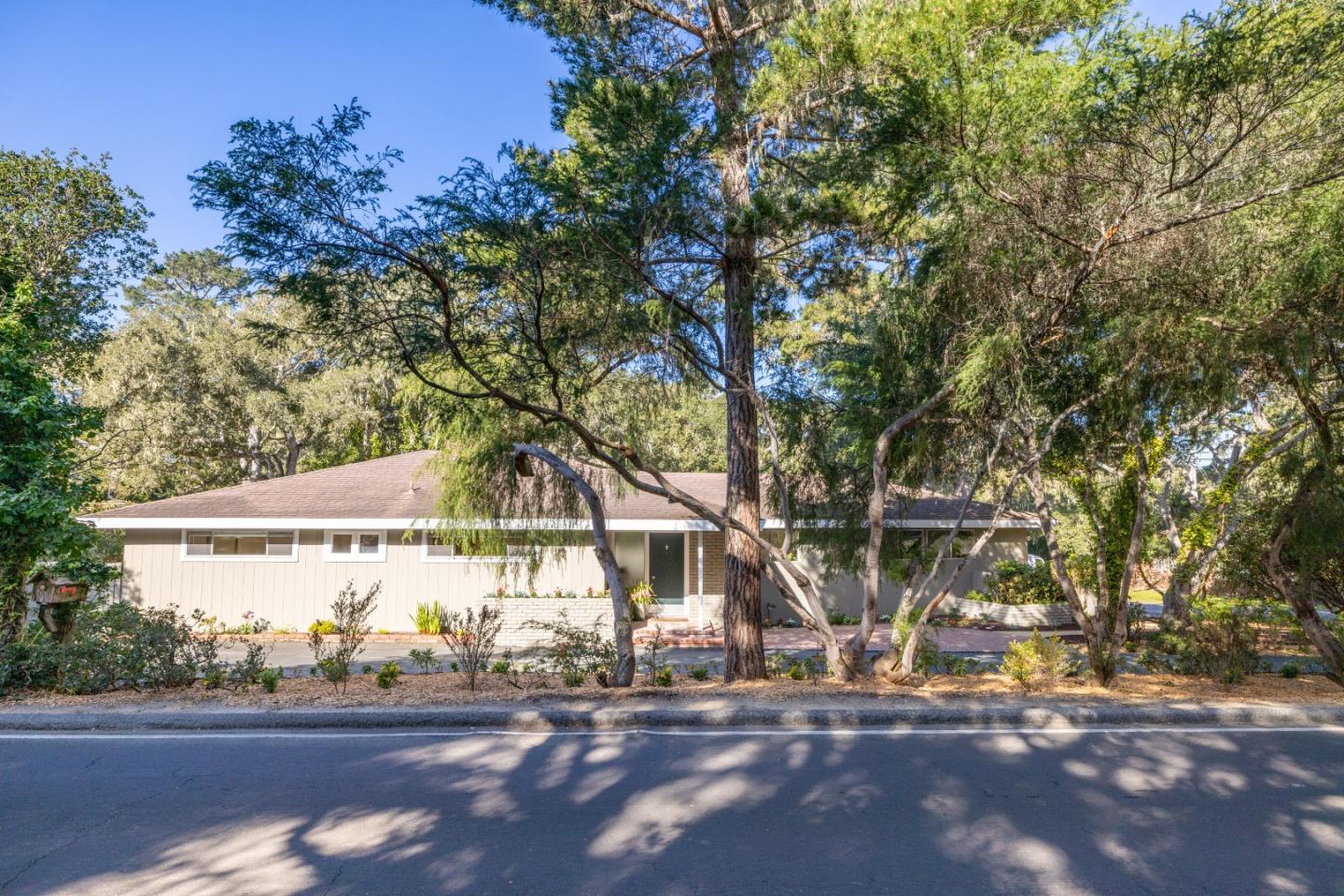 3112 Stevenson Drive Pebble Beach, CA 93953 - Photo 45 of 47 a view of a street with tree s