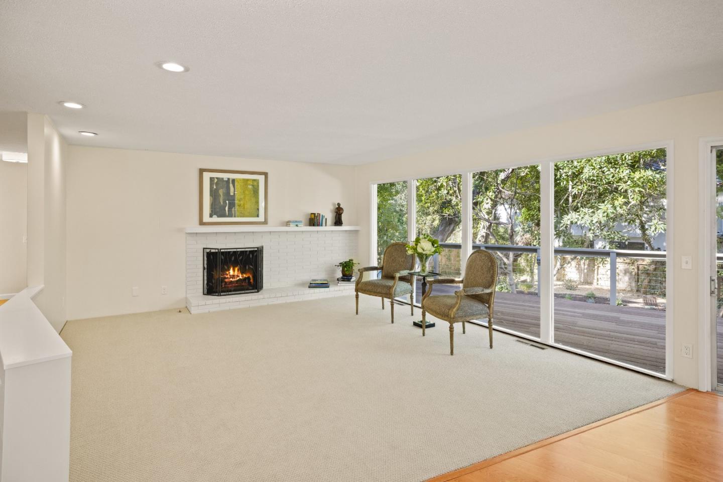 3112 Stevenson Drive Pebble Beach, CA 93953 - Photo 9 of 47 a view of a livingroom with furniture and a fireplace