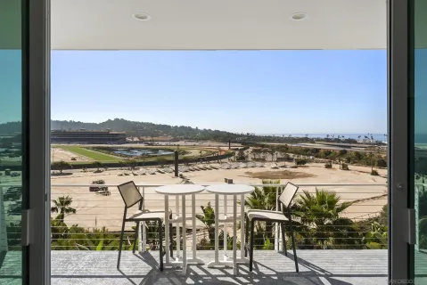 a view of a balcony with an ocean view