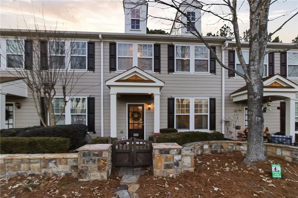 a front view of a house with patio