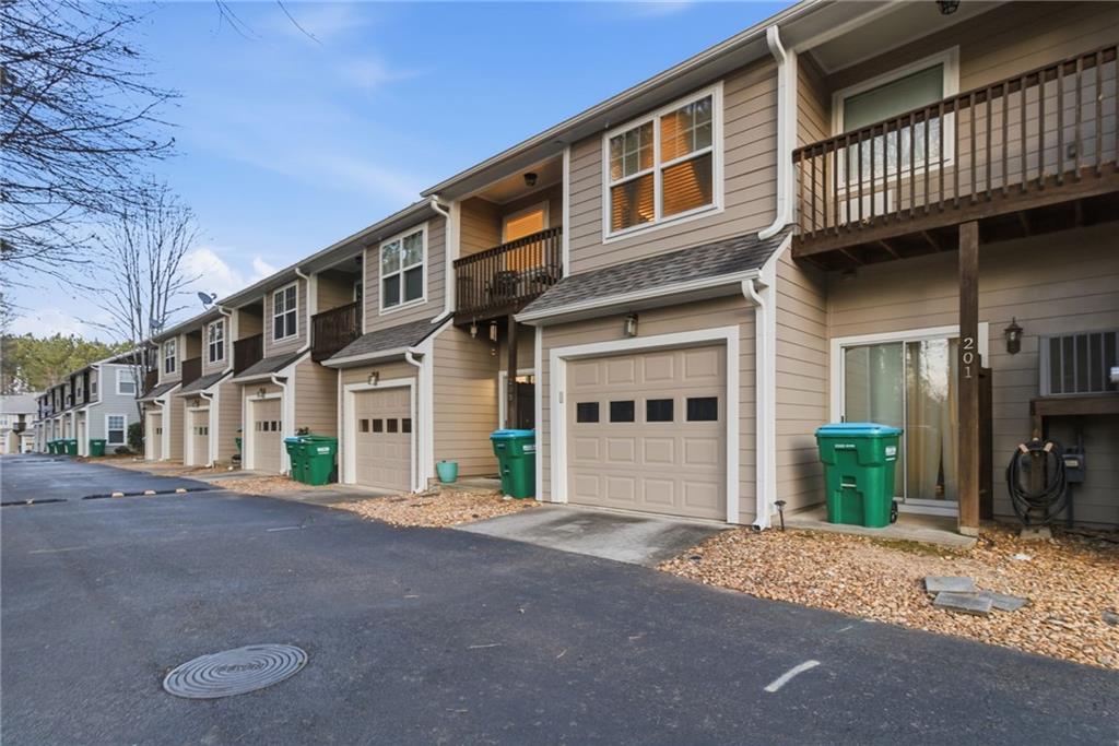 203 River Green Avenue Canton, GA 30114 - Photo 25 of 28 a front view of a house with a yard