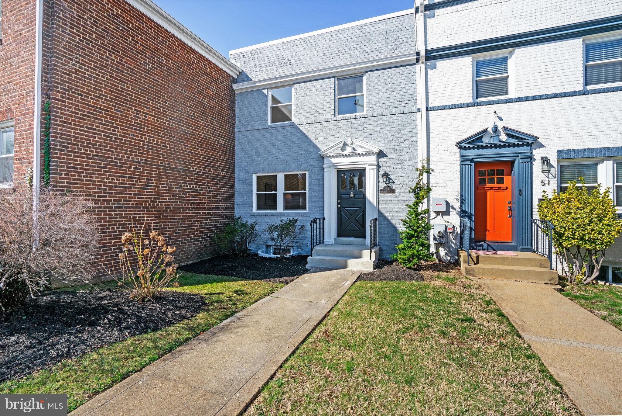53 Franklin Street Northeast Washington, DC 20002 - Photo 1 of 33 a front view of a house with garden