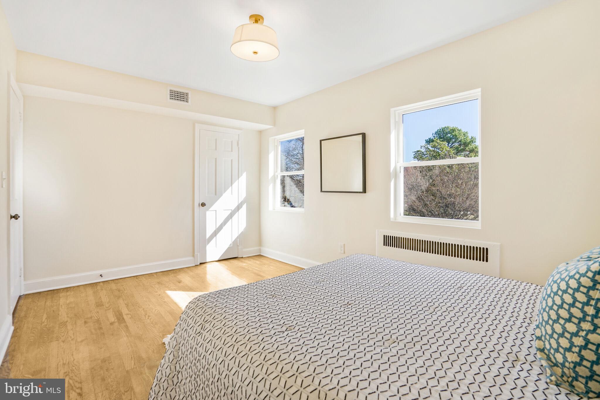 53 Franklin Street Northeast Washington, DC 20002 - Photo 16 of 33 a bedroom with a bed and a window