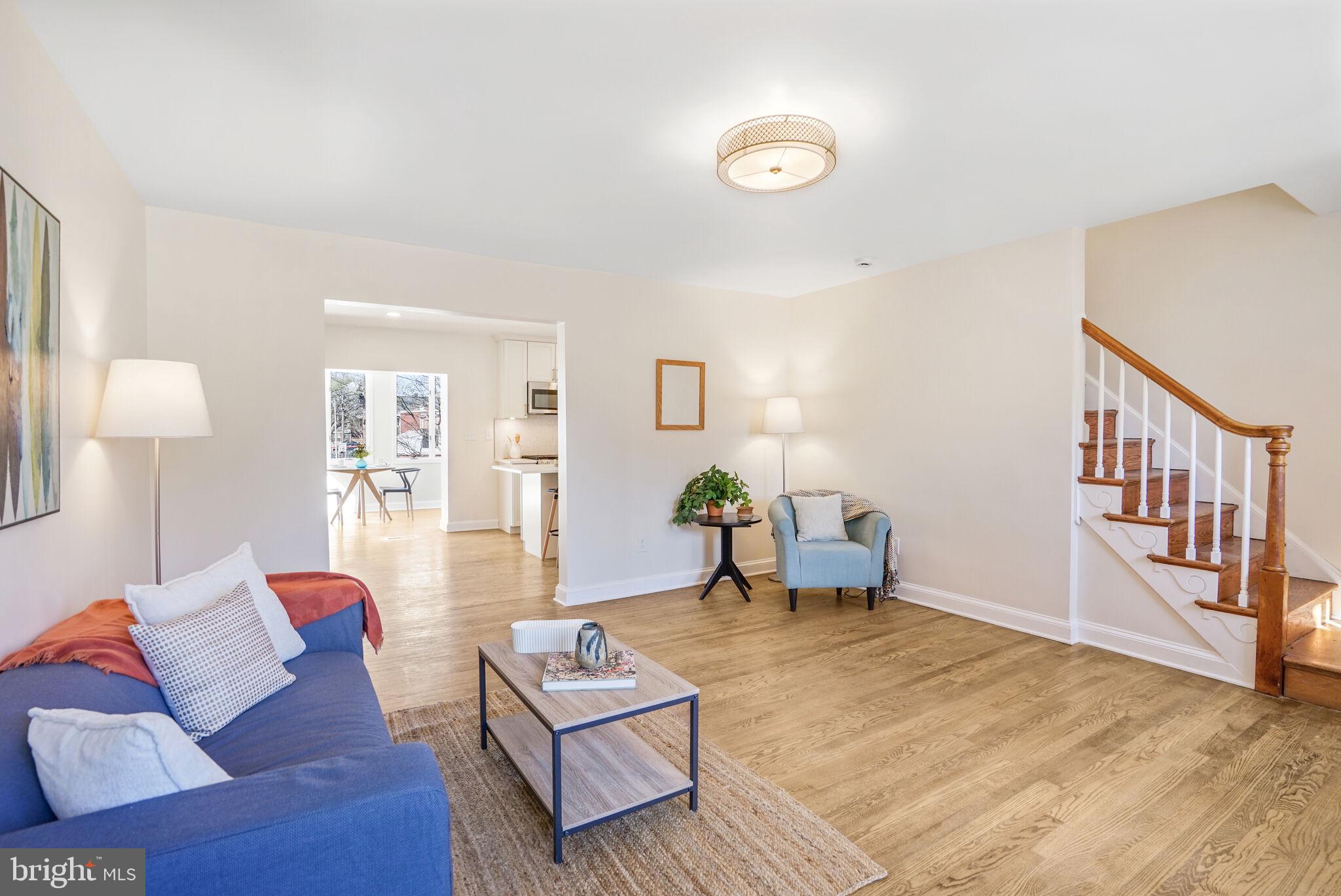 53 Franklin Street Northeast Washington, DC 20002 - Photo 2 of 33 a living room with furniture and a table