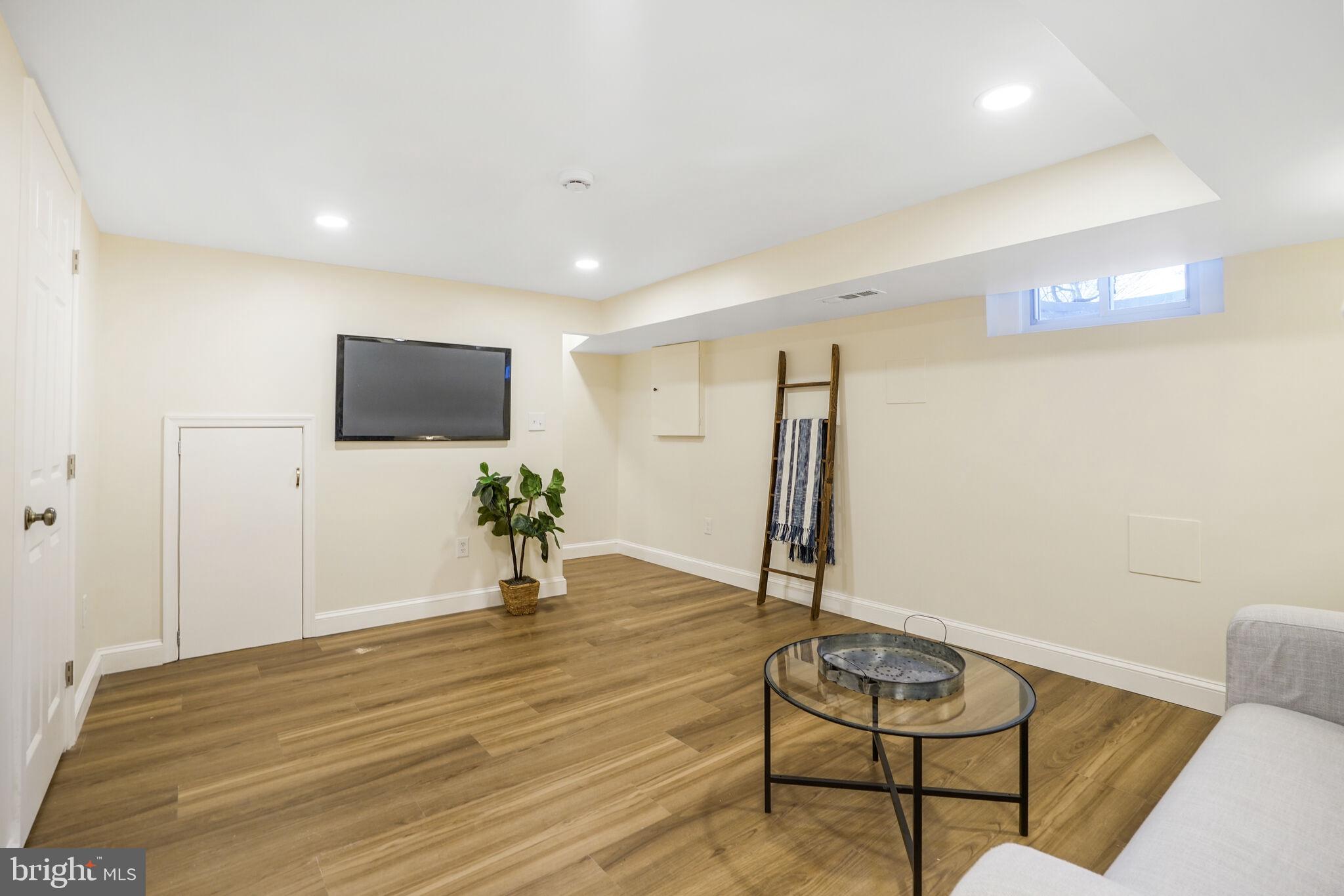 53 Franklin Street Northeast Washington, DC 20002 - Photo 23 of 33 a view of a livingroom with furniture and wooden floor