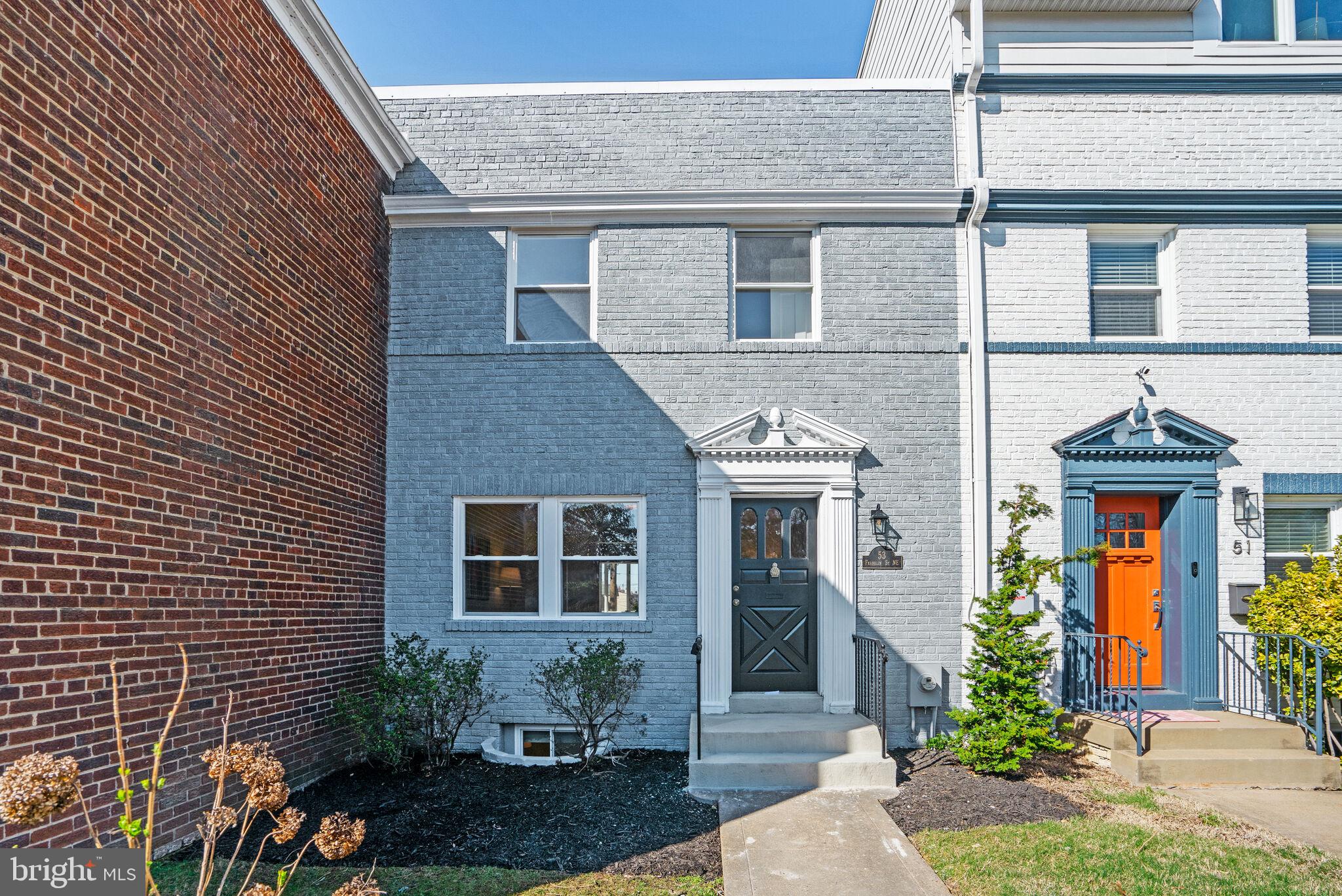 53 Franklin Street Northeast Washington, DC 20002 - Photo 29 of 33 a front view of a house with garden