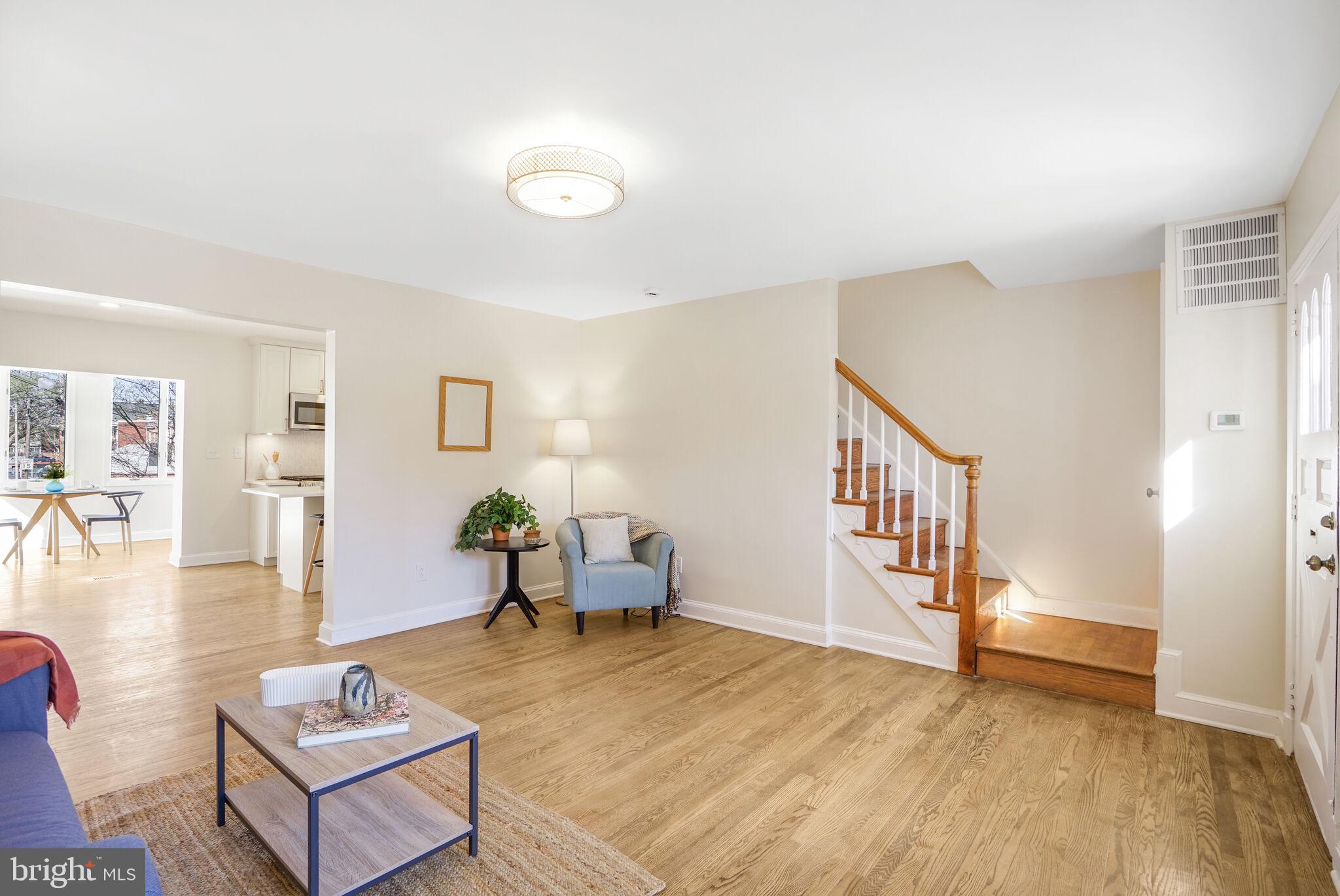 53 Franklin Street Northeast Washington, DC 20002 - Photo 9 of 33 a living room with furniture and a wooden floor