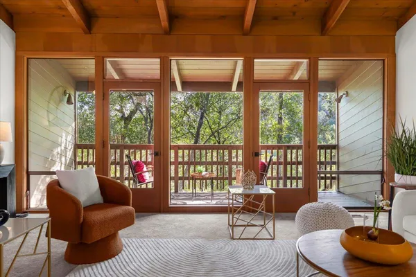 a living room with furniture and a window