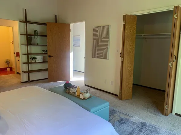 a view of an empty walk in closet
