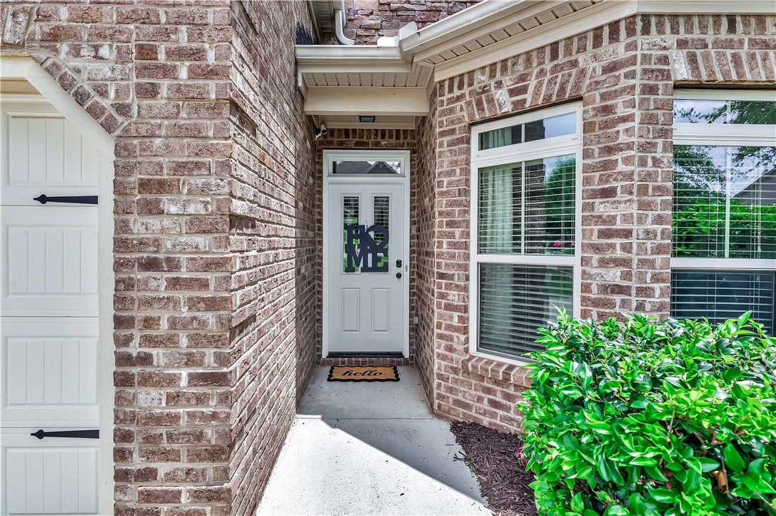 144 Buckland Drive Anderson, SC 29621 - Photo 2 of 48 A classic brick exterior with well-maintained landscaping provides an inviting entry.