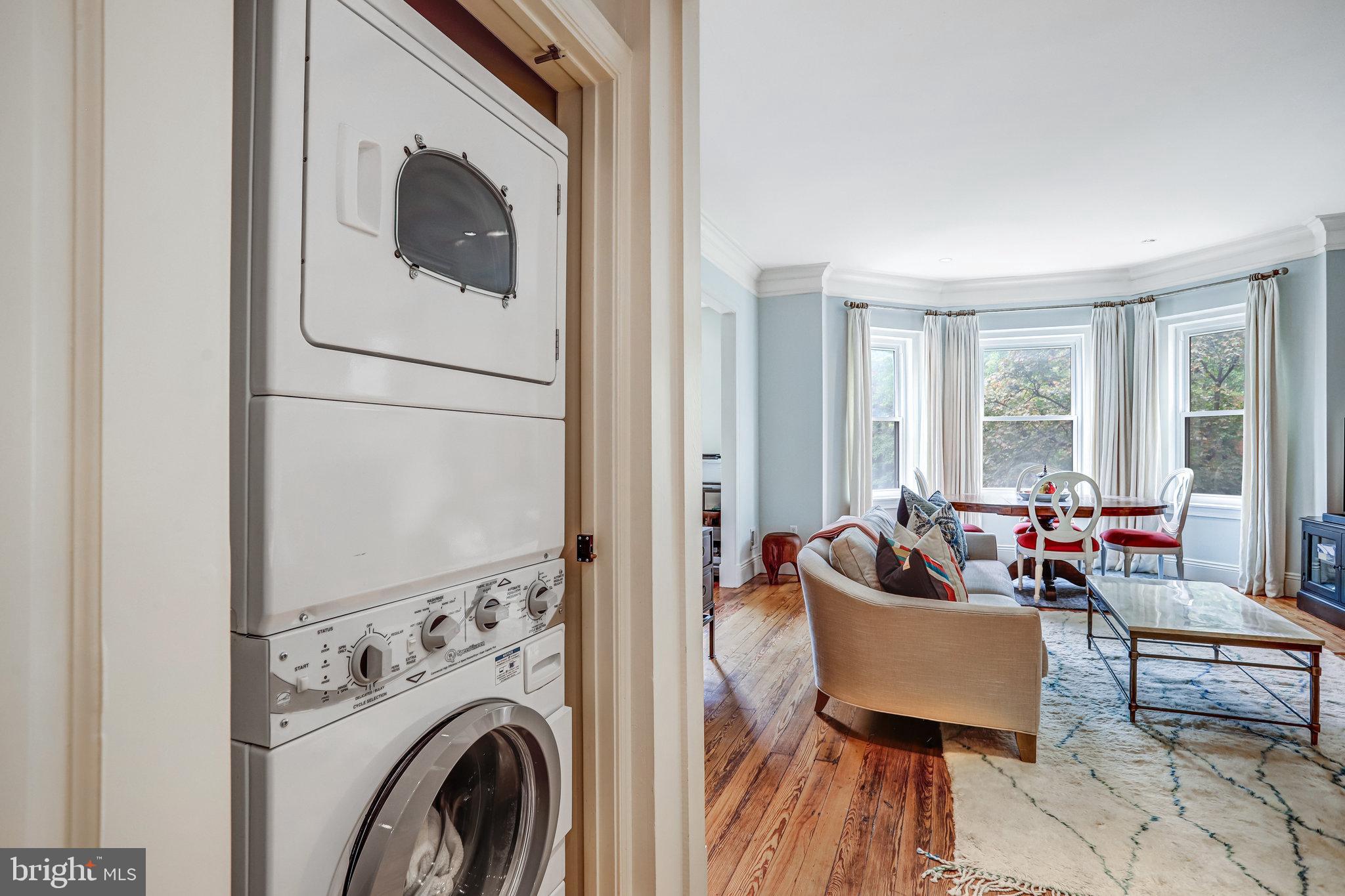 1820 Kalorama Road Northwest, Unit 3 Washington, DC 20009 - Photo 17 of 32 a living room with furniture and a fireplace
