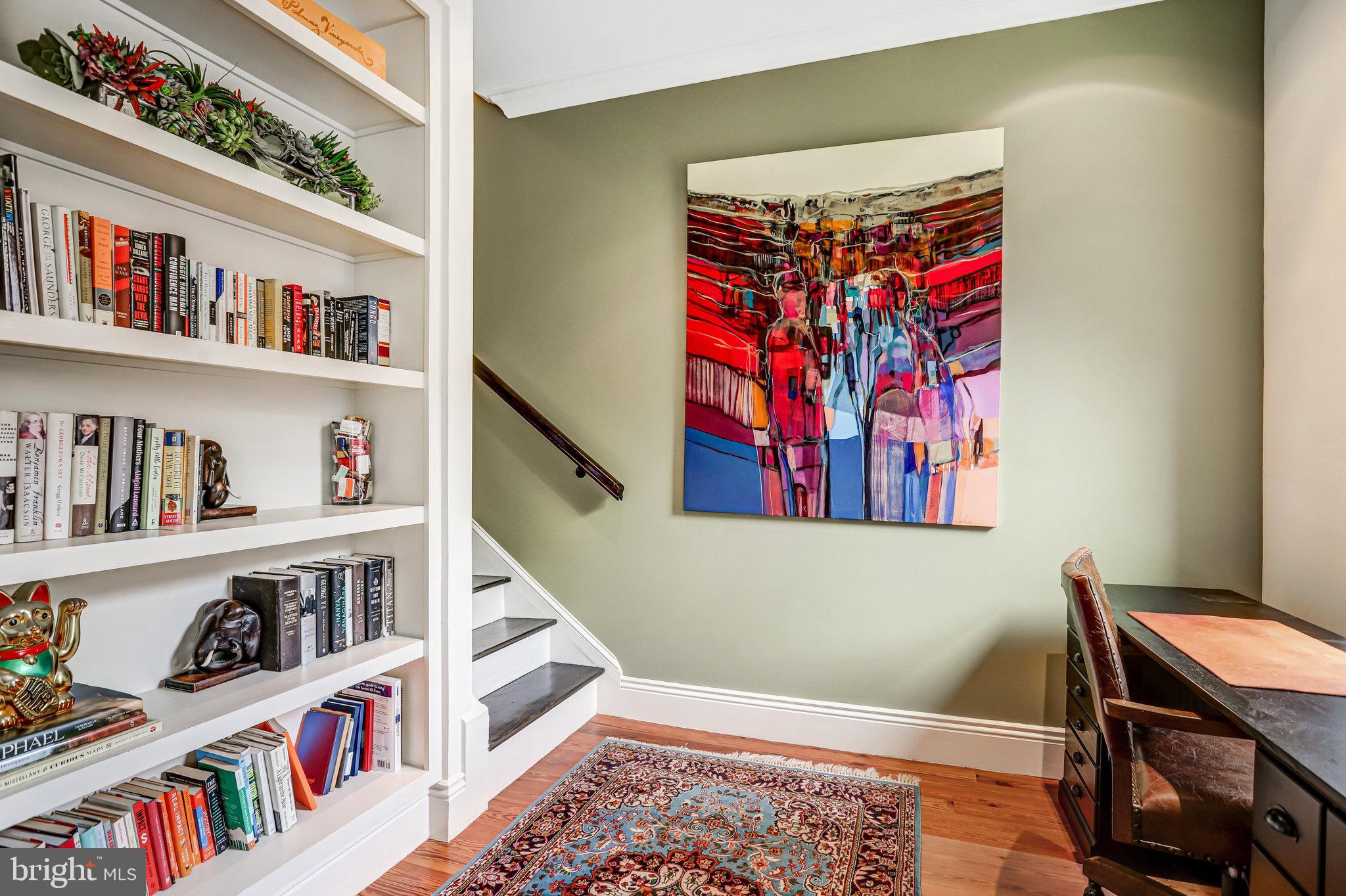 1820 Kalorama Road Northwest, Unit 3 Washington, DC 20009 - Photo 18 of 32 a room with furniture and book shelf
