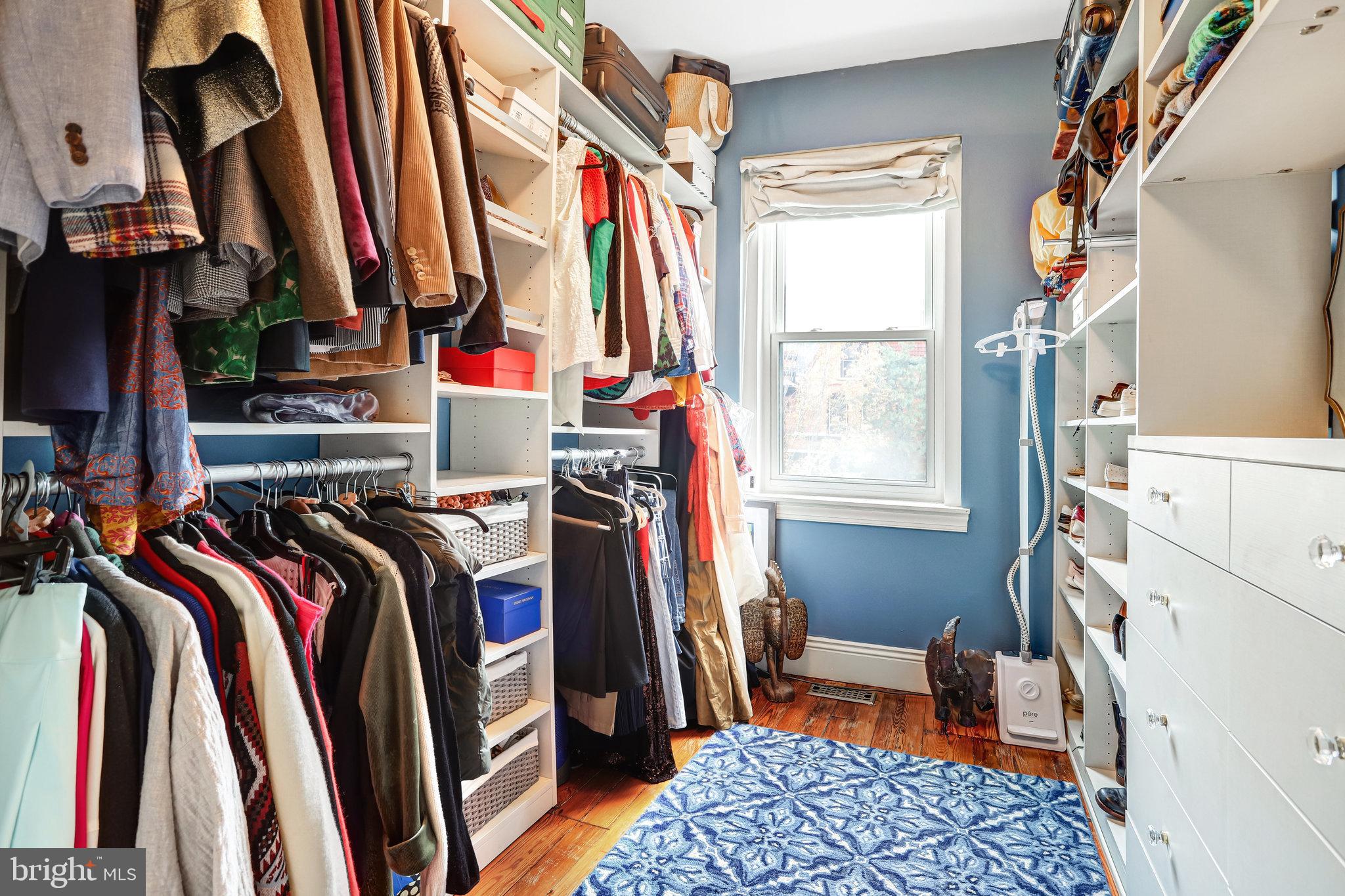 1820 Kalorama Road Northwest, Unit 3 Washington, DC 20009 - Photo 25 of 32 a view of walk in closet with clothes and shoes