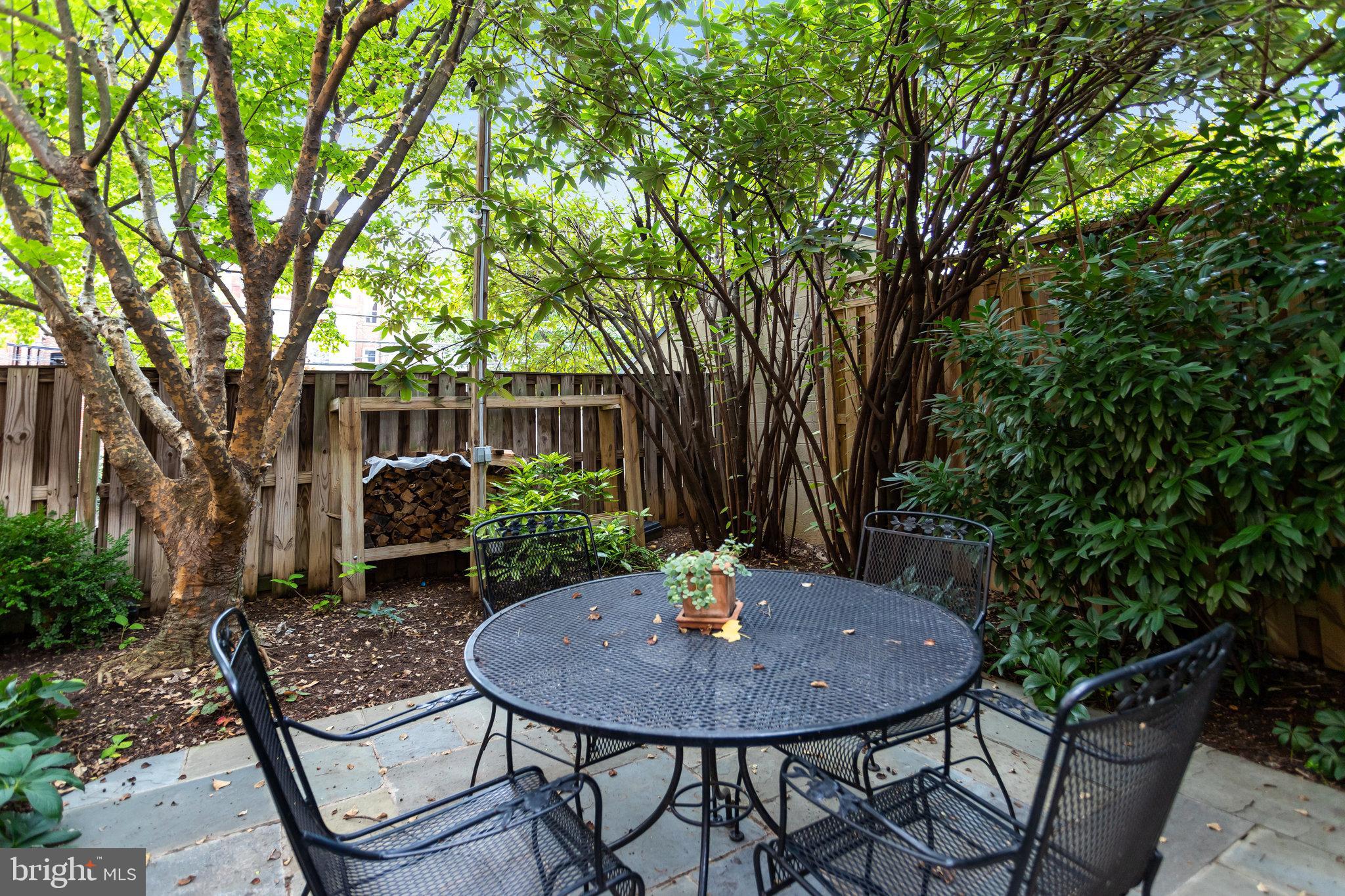 1820 Kalorama Road Northwest, Unit 3 Washington, DC 20009 - Photo 30 of 32 a view of backyard with seating and green space