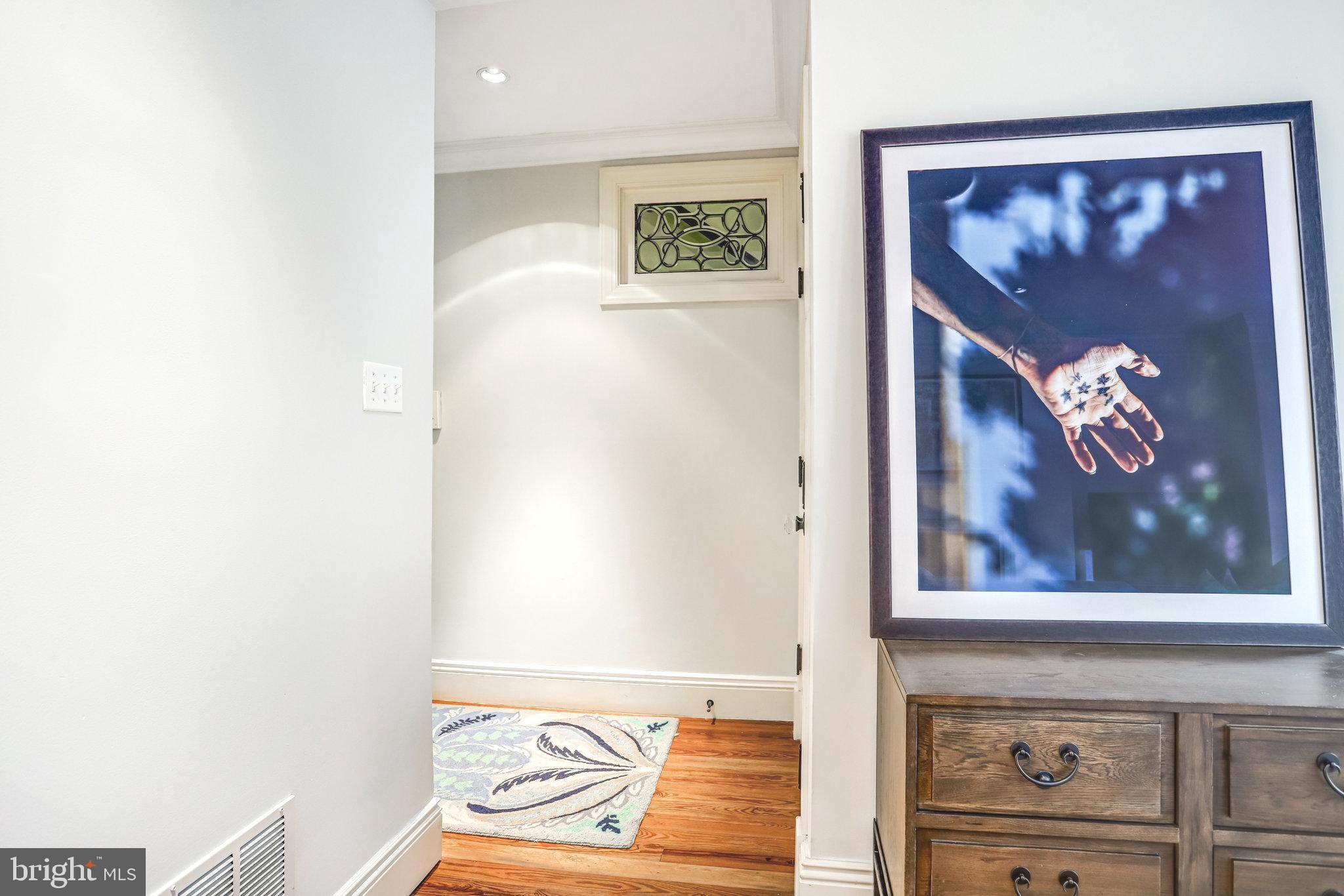 1820 Kalorama Road Northwest, Unit 3 Washington, DC 20009 - Photo 9 of 32 a view of a painting on the wall