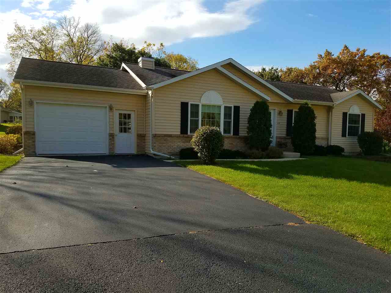 419 Elizabeth Road Oregon, IL 61061 - Photo 1 of 13 a front view of a house with a yard