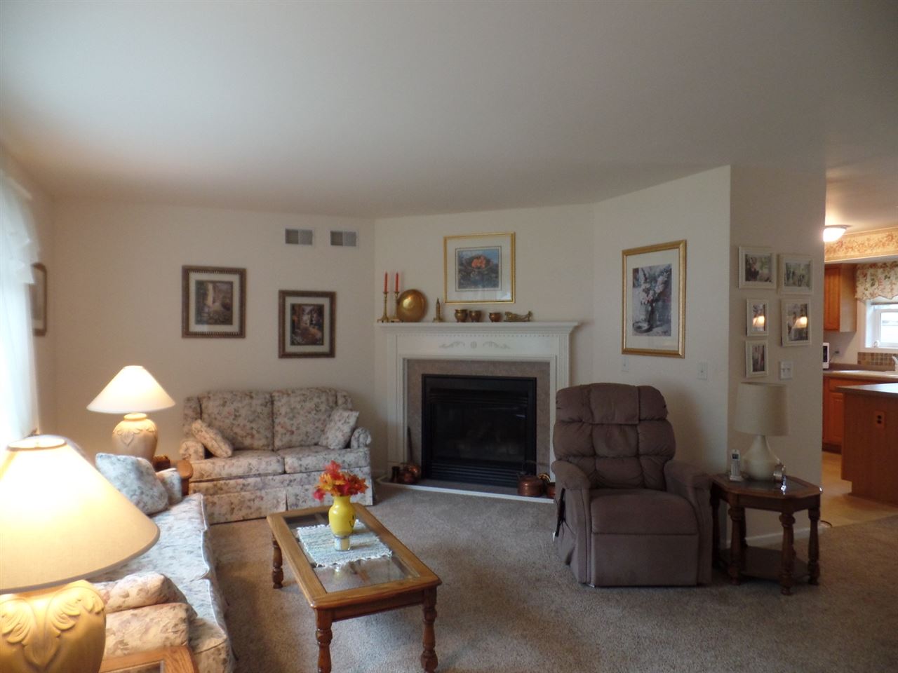 419 Elizabeth Road Oregon, IL 61061 - Photo 6 of 13 a living room with furniture and a fireplace