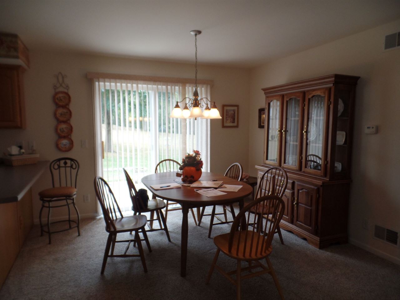 419 Elizabeth Road Oregon, IL 61061 - Photo 8 of 13 a view of a dining room with furniture window and outside view