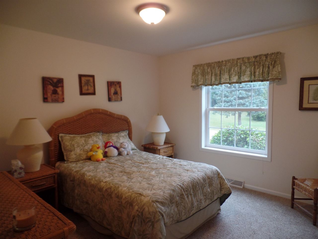 419 Elizabeth Road Oregon, IL 61061 - Photo 10 of 13 a bedroom with a bed and window