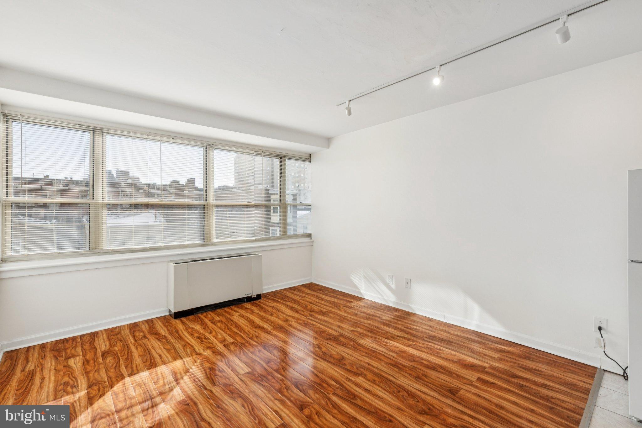 1810 Rittenhouse Square, Unit 406 Philadelphia, PA 19103 - Photo 15 of 17 Bright and airy urban living space.