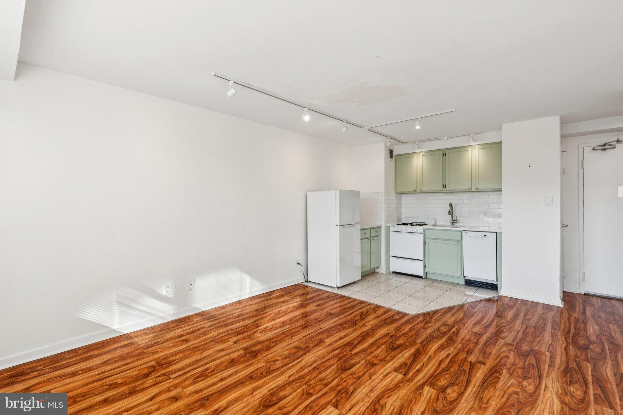 1810 Rittenhouse Square, Unit 406 Philadelphia, PA 19103 - Photo 6 of 17 Bright and airy kitchen in modern space.