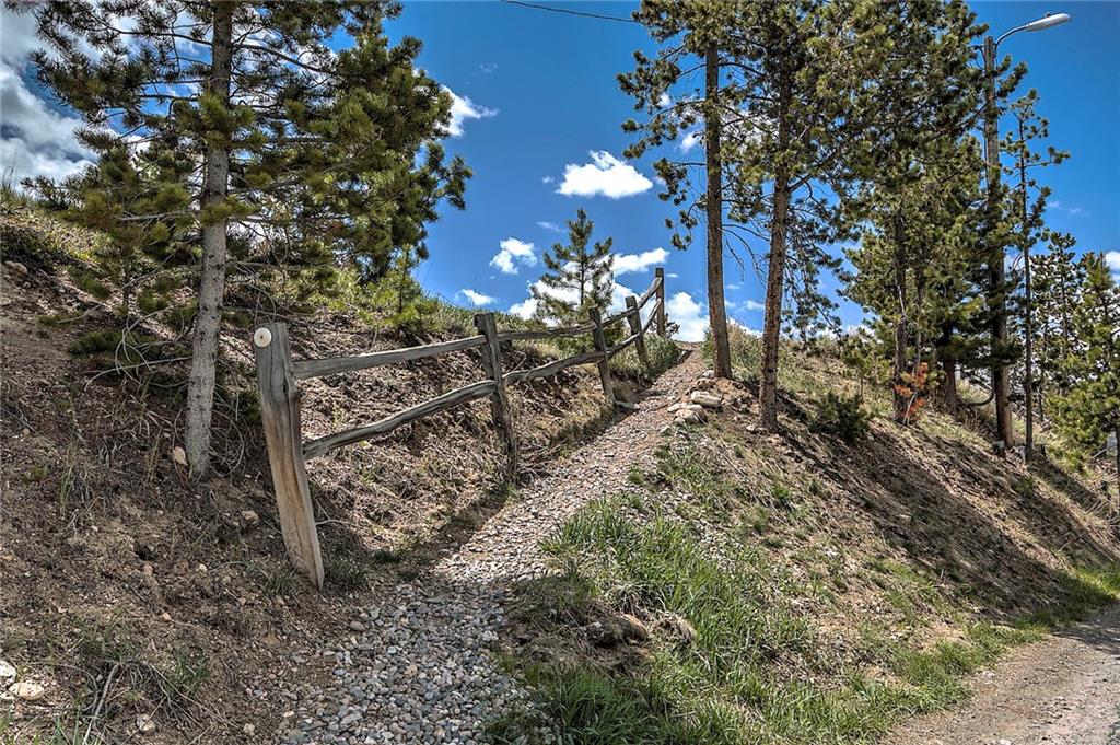 150 Evergreen Road, Unit 205 Dillon, CO 80435 - Photo 17 of 18 a view of a wooden fence