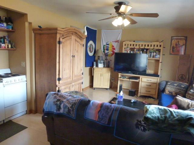 150 Evergreen Road, Unit 205 Dillon, CO 80435 - Photo 5 of 18 a bedroom with furniture and a flat screen tv
