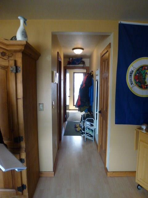 150 Evergreen Road, Unit 205 Dillon, CO 80435 - Photo 8 of 18 a view of a hallway with wooden furniture