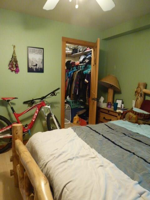 150 Evergreen Road, Unit 205 Dillon, CO 80435 - Photo 10 of 18 a bedroom with bed and a mirror