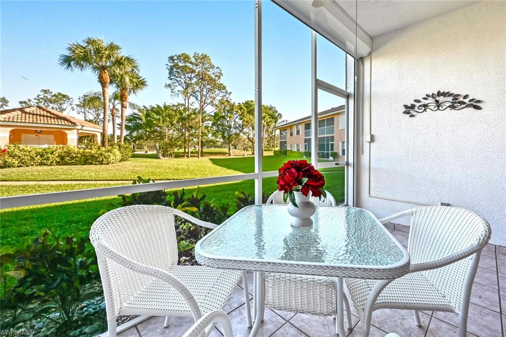 565 Augusta Boulevard, Unit 24 Naples, FL 34113 - Photo 26 of 26 a view of outdoor space yard and patio